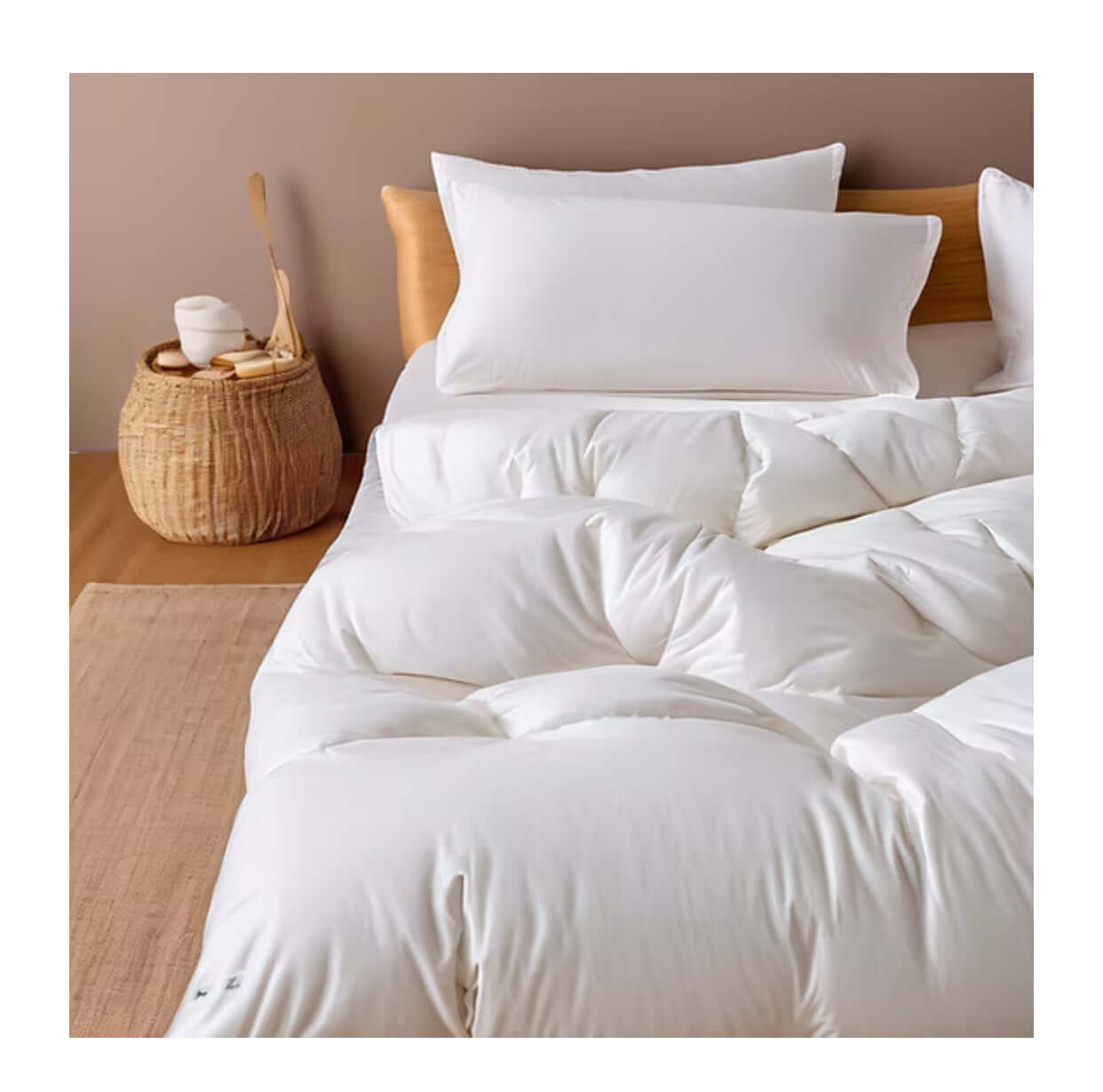 Hypo-Allergenic Bamboo Doona on a bed with pillows, showcasing soft and breathable luxury bedding.