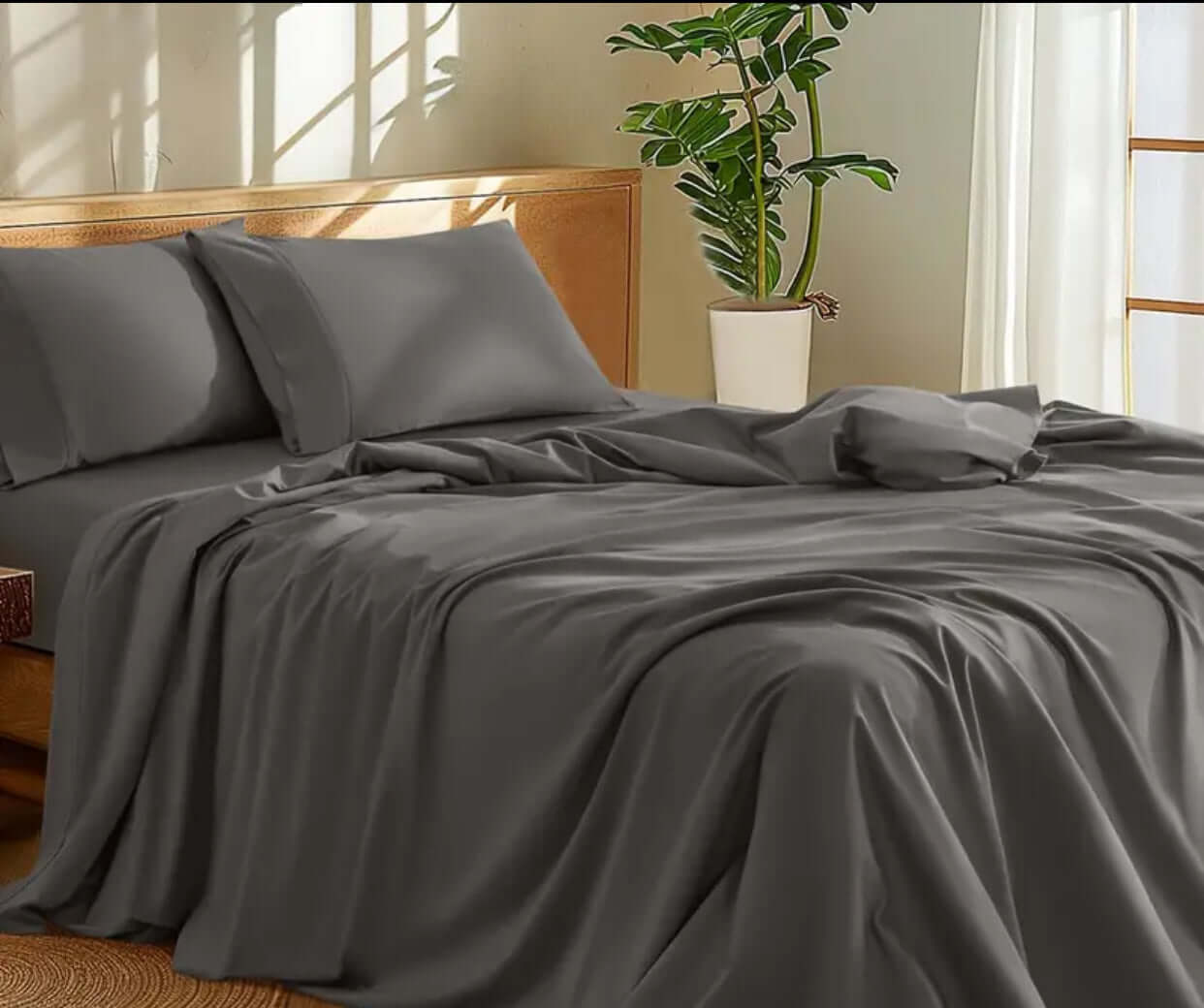 100 Percent Washed Cotton Sheet Set in gray on a bed, showcasing soft and breathable natural fibers.